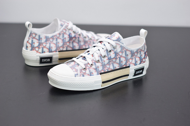 dio* b23 low-top sneaker in blue & red oblique